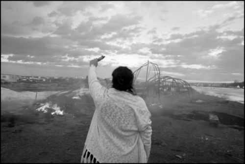 Larry Towell USA. Oceti Sakowin Camp, Standing Rock, North Dakota. 2017. Ritual burning of structures.jpg