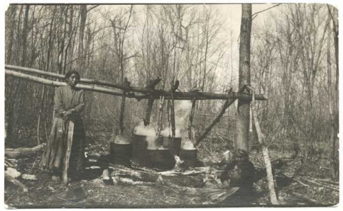 Ojibwe women making maple sugar  Cass Lake Leech Lake Reservation of Ojibwe, 1920..jpg