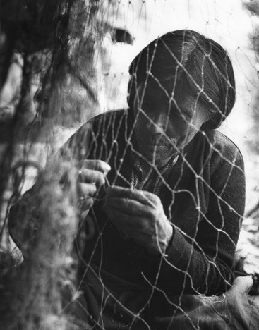 Richard S Finnie  Elder woman mending fish net - Rae - 1939 .jpg