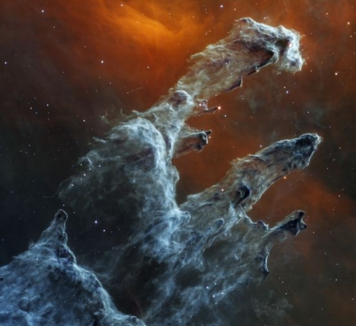Les Piliers de la Création (dans la nébuleuse de l'Aigle) photographiés dans l'infrarouge moyen par le télescope spatial James Webb._n.jpg