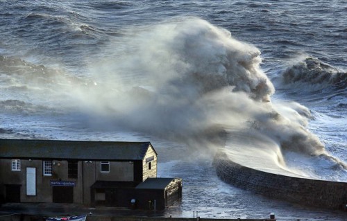 Photographer unwittingly captures an amazing image of a horse - as UK's coast is battered by the ongoing storm.jpg