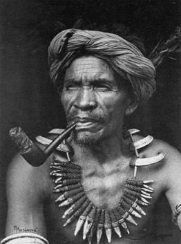 Eduardo Masferré Respected elder Lakay Kabayo, wearing his Buaya (ceremonial necklace) with boar, dog and crocodile teeth in woven rattan. Sagada, Mountain Province 1950.jpg